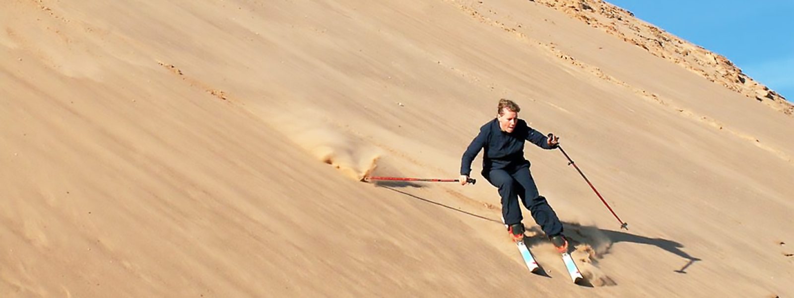 Experience the Ultimate Thrill of Sand Skiing at Dubai Desert Safari